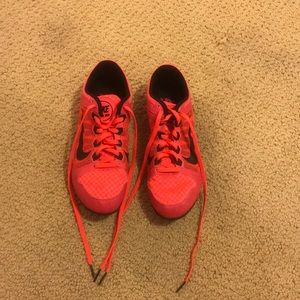 Pink Nike all-purpose track spikes